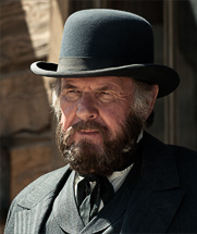 Tom Wilkinson as Latham Cole in The Lone Ranger (2013)