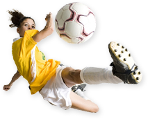 Girl kicking a ball.